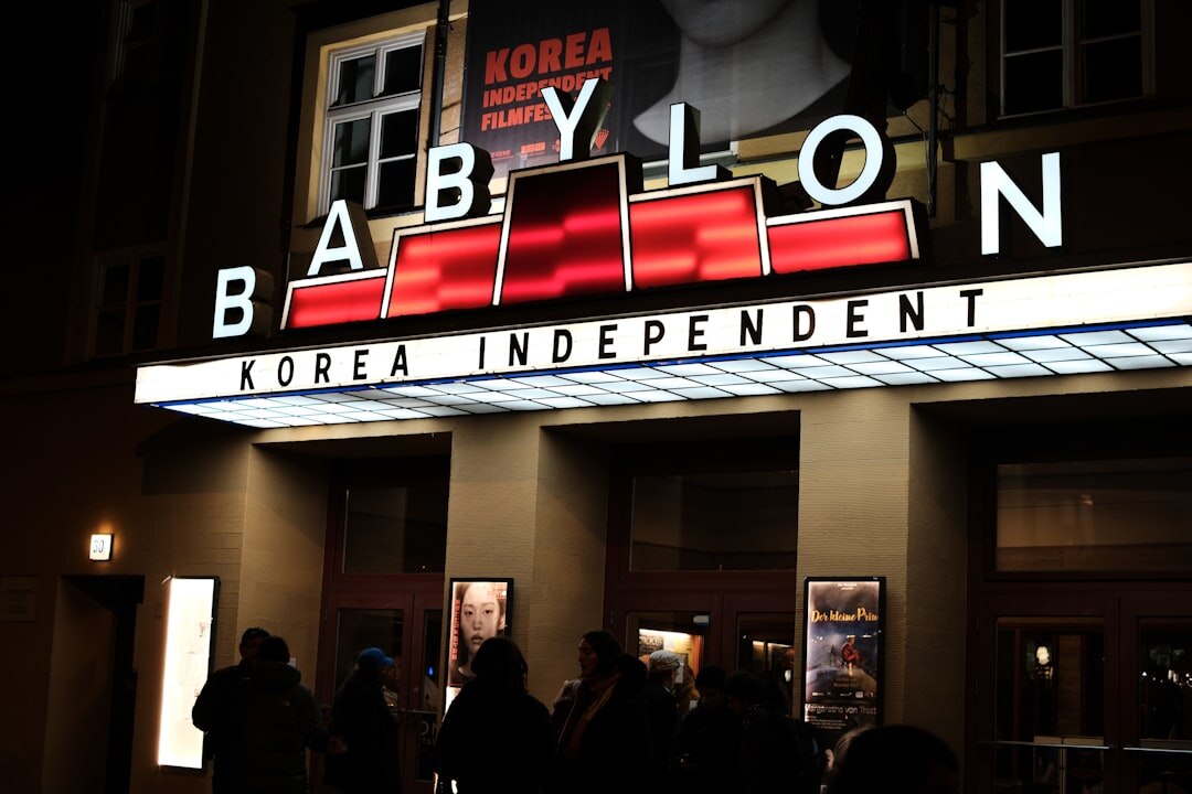 Cinema marquee lights at a film festival venue at night