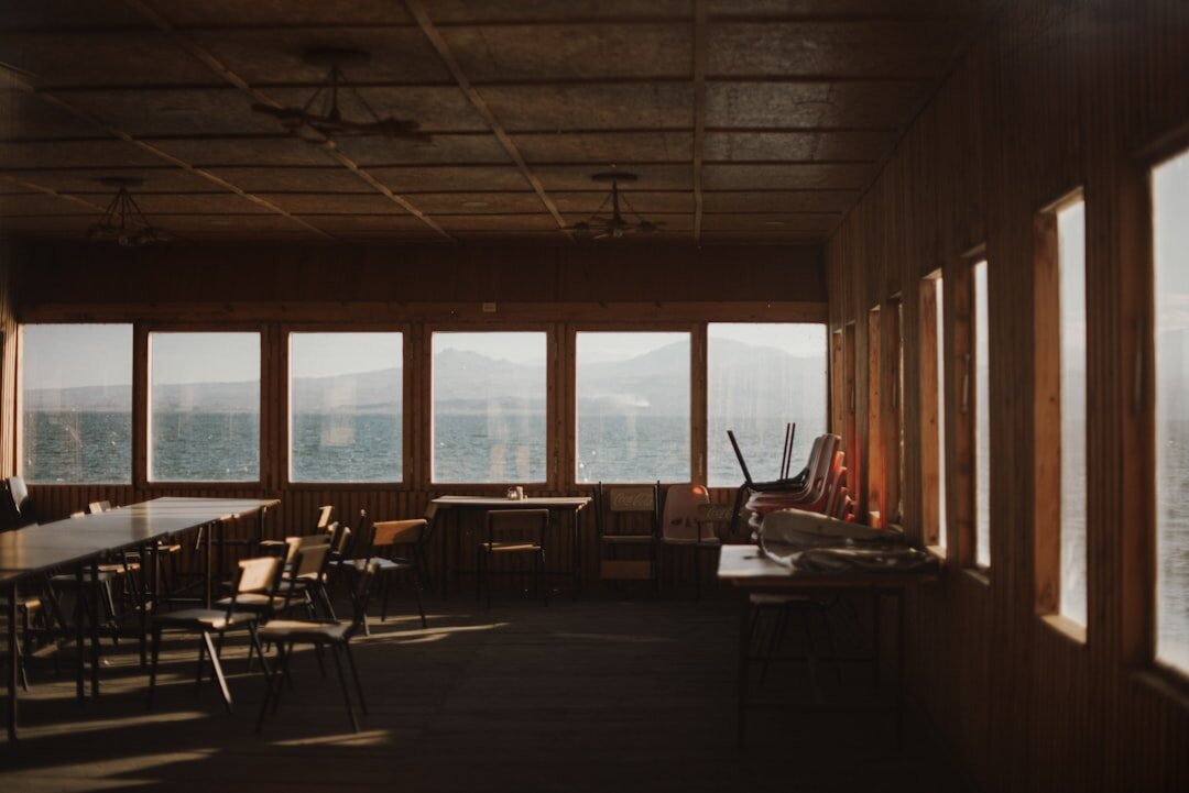 Modern editorial office with large windows and warm lighting